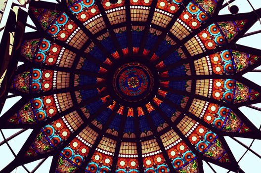 Colorful, ornate window in the form of a circle High quality photo