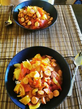 A bowl of food on a plate. High quality photo