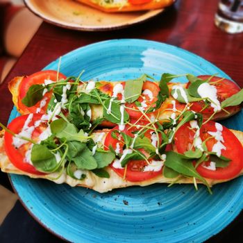 A plate of food on a table. High quality photo