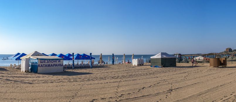 Chernomorsk, Ukraine 08.22.2020. Panoramic view of the Public beach in Chernomorsk city on a sunny summer morning