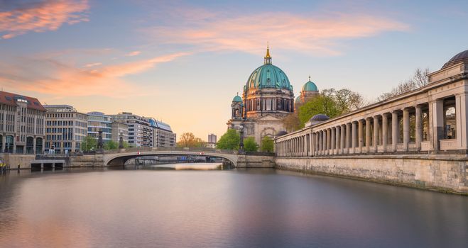 Berlin skyline with Berlin Cathedral (Berliner Dom) and Spree river at sunset twilight, in  Germany