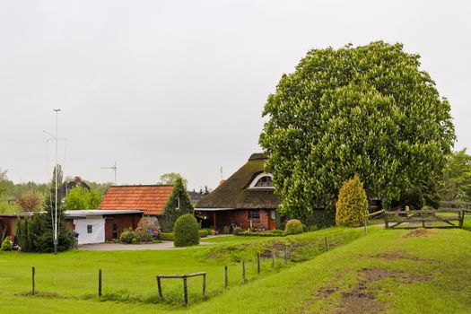 Idyllic beautiful typical German farmhouse in Brake Lower Saxony Germany.