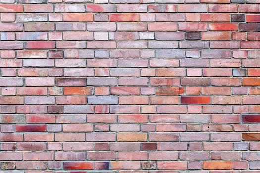 old brown brick wall outdoor closeup. abstract bacrground 