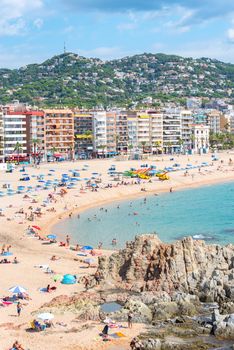 Lloret de Mar, Spain : 2020 2 Sept : People in the beach of Lloret de Mar after Covid 19 without international tourists in summer 2020