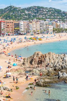 Lloret de Mar, Spain : 2020 2 Sept : People in the beach of Lloret de Mar after Covid 19 without international tourists in summer 2020