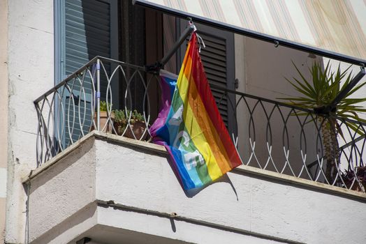 terni,italy september 02 2020:peace flag placed on a balcony of a house