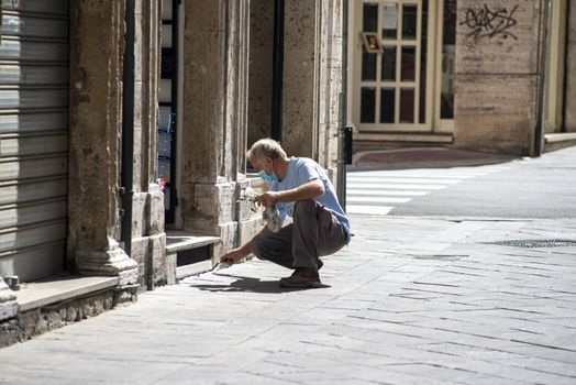 terni,italy september 02 2020:house painter at work on a shop