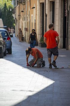 terni,italy september 02 2020:men of the municipality at work on the road