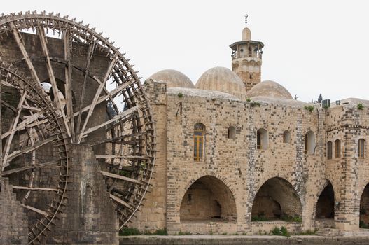 The Norias of Hama, Syria are ancient hydropowered machines used to lift water into a small aqueduct, along the Orontes River in the city of Hama, They are unique not only to Syria but probably the worldwide