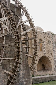 The Norias of Hama, Syria are ancient hydropowered machines used to lift water into a small aqueduct, along the Orontes River in the city of Hama, They are unique not only to Syria but probably the worldwide