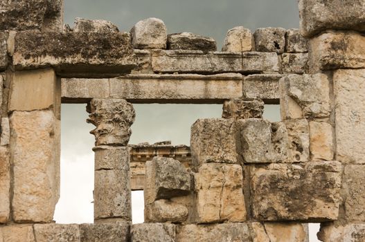 Apamea, Syria - May, 2009: Syria before the war. the Great Colonnade and triumphal arches in the impressive Apamea Greek and Roman city of Apamea in Syria. Apamea was an ancient Greek and Roman city on the banks of the Orontes River in Syria. The site includes the famous Great Colonnade, one of the longest in the world. As a result of the ongoing civil war in Syria that started in 2011, the Apamea ruins have been damaged and looted by treasure hunters.