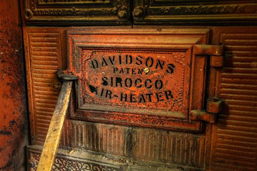 Kandy, Sri Lanka - April 12th, 2017: Detail of old Sirocco air heater oven door. This vintage oven (manufactured by Davidson & Co, Belfast, Ireland) is still used to dry tea in Kadugannawa Tea Factory