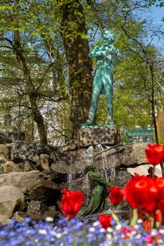Bergen, Norway, May 2015: Ole Bul Fountain with violin player and harp player statue or sculpture in Bergen, Norway