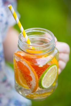 Fruit lemonade in jar. Healthy Spa Water with Fruit