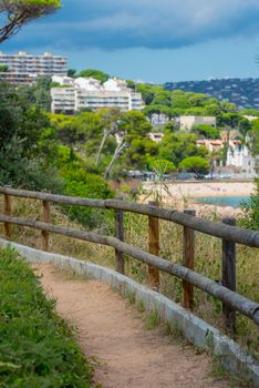 View to Sant Pol beach in the Village of Sant Feliu de Guixols at Costa Brava in Catalonia,Mediterranean Sea,Spain.