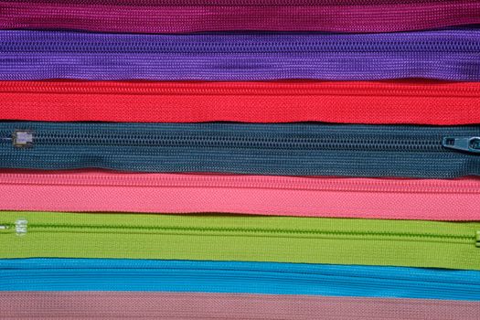 Colorful zipper for sewing and arrange as a background.