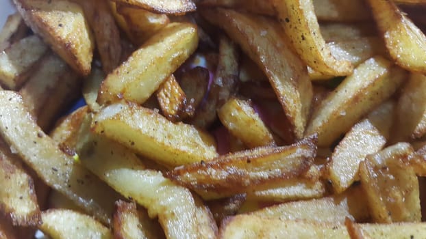 Potato fried or roasted slices on clean background with copy space for text