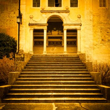 A long stair create the perspective to this 15th century Italian chapel.