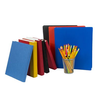 Brightly colored horizontal shot of books, notebooks and pencils in pencil holder isolated on white background