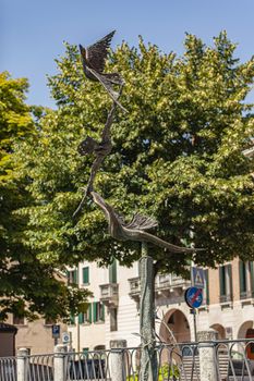 TREVISO, ITALY 13 AUGUST 2020: Bird statue in Treviso in Italy