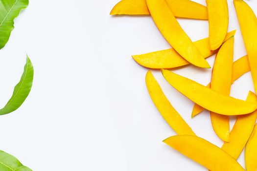 Tropical fruit, Mango slices on white background. Top view