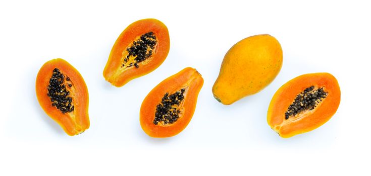 Papaya fruit on white background. Top view