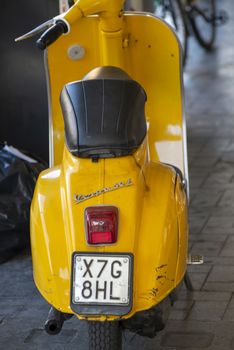 terni,italy september 05 2020:vintage piaggio vespa in yellow color