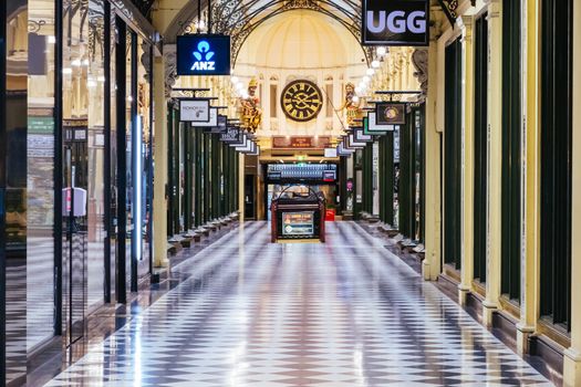 Melbourne, Australia - August 17, 2020: Collins St within Melbourne CBD is quiet and deserted during the Coronavirus pandemic. Melbourne is currently under Stage 4 lockdown and night curfew after a 2nd wave of infections.