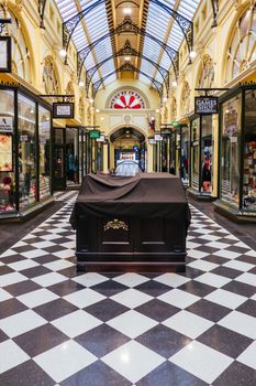 Melbourne, Australia - August 17, 2020: Collins St within Melbourne CBD is quiet and deserted during the Coronavirus pandemic. Melbourne is currently under Stage 4 lockdown and night curfew after a 2nd wave of infections.