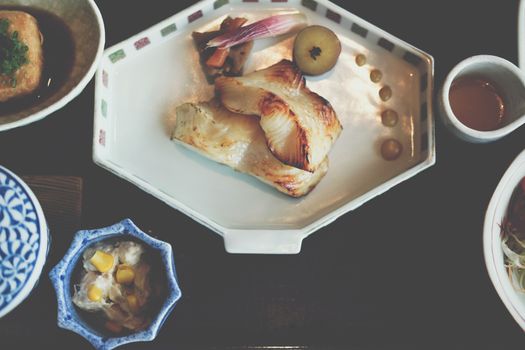 grilled yellow tail fish with salt. japanese lunch food menu set