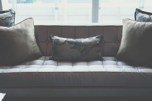 gray sofa chair in living room. home hotel resort interior