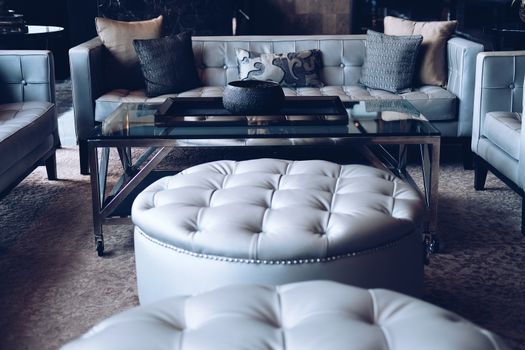 gray sofa chair in living room. home hotel resort interior