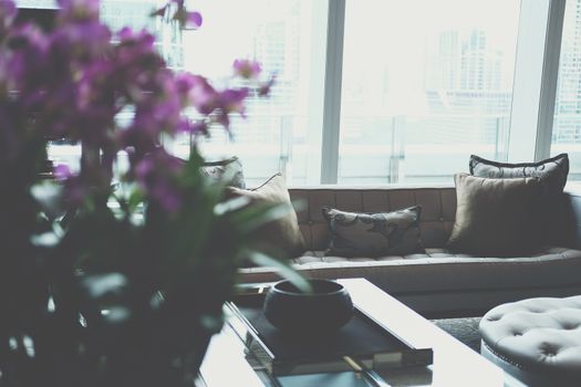gray sofa chair in living room. home hotel resort interior