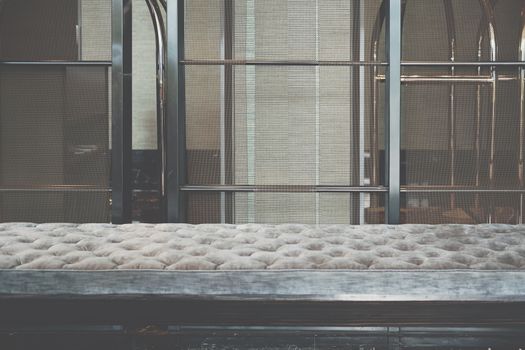 metal mesh blind and seat in living room