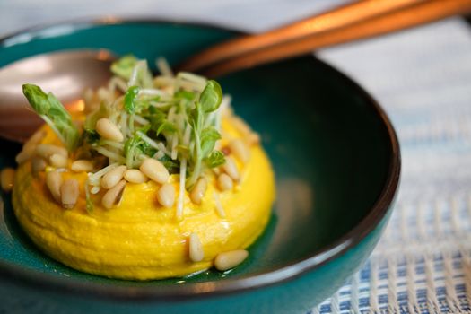 pumpkin hummus with pea sprout. vegan vegetarian middle eastern appetizer food