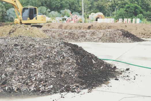 organic compost heap. fertilizer production for soil cultivation in agriculture industry