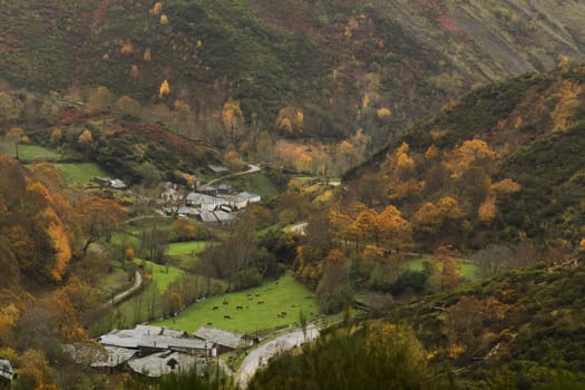 Small villages in the middle of a valley in autumn