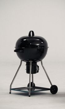 BBQ stove that made from black color steel for party or family picnic and on white background studio.