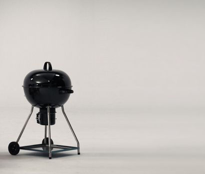 BBQ stove that made from black color steel for party or family picnic and on white background studio.