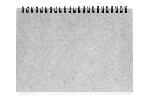 Grey spiral notebook on isolated white background