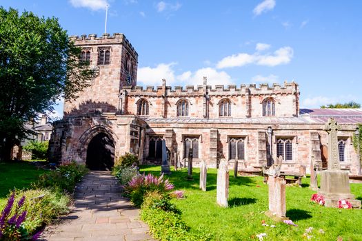 Appleby UK 28th Aug 2020 The flower lined entrance to the 12th century St Lawrence's Church, Appleby, Cumbria, England