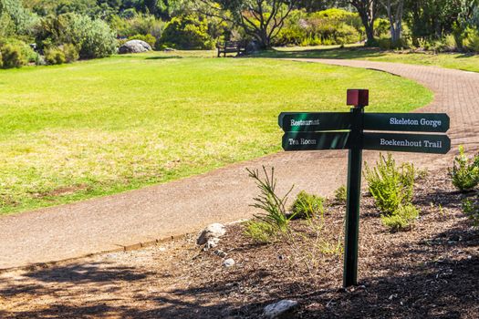 Signposted hiking trails green turquoise sign in Kirstenbosch, Cape Town, South Africa.