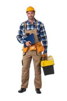 Contractor worker in coveralls and hardhat with toolbox and document folder isolated on white background, full length portrait