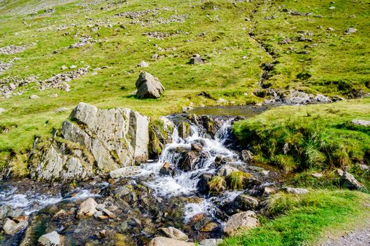 Close up of small waterfall at Kirkstone Pass Lake District UK