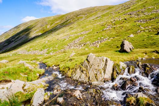 Close up of small waterfall at Kirkstone Pass Lake District UK