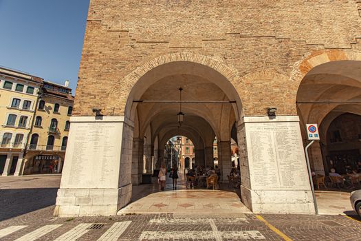TREVISO, ITALY 13 AUGUST 2020: Historical buildings with arcades in Treviso city center in Italy