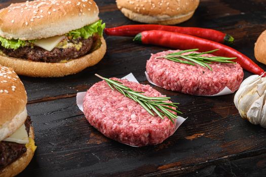 Raw ground beef on wooden table.