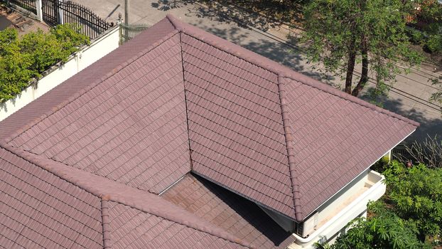 Roof of house that old and dirty and made from ceramic material and high angle view.