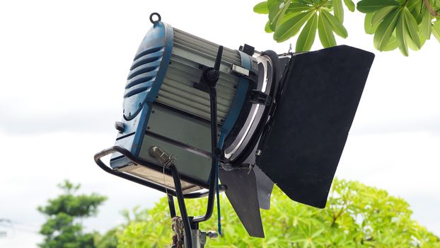 Production light equipment for video or movie shooting at outdoor location.