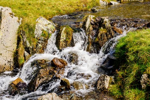 Close up of small waterfall at Kirkstone Pass Lake District UK